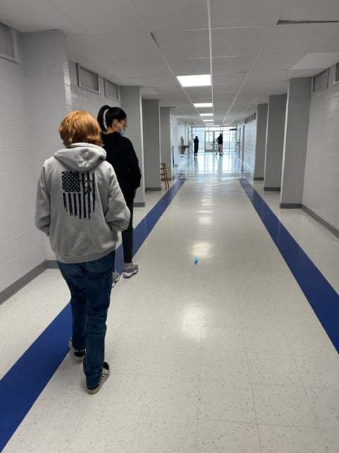 students walking in the hallway